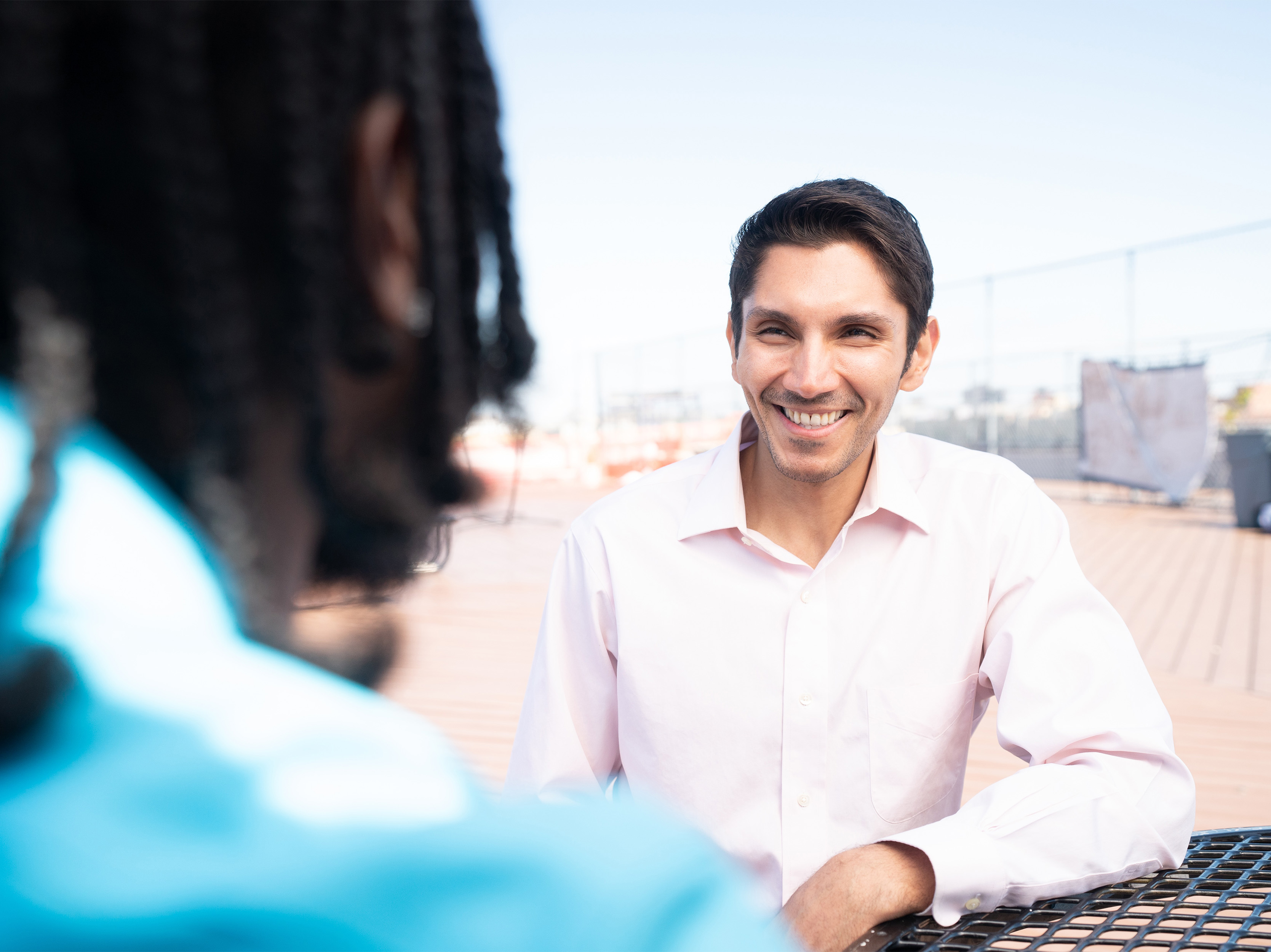 two young men speaking