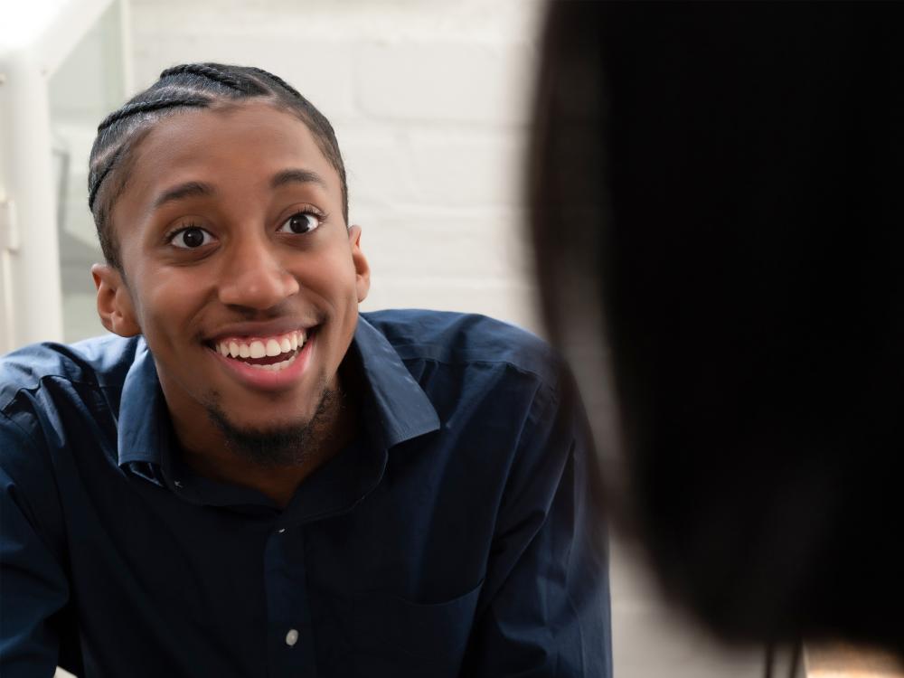 young man speaking